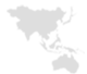 En ljusgrå, förenklad karta som markerar kontinenterna Asien och Australien mot en vit bakgrund.